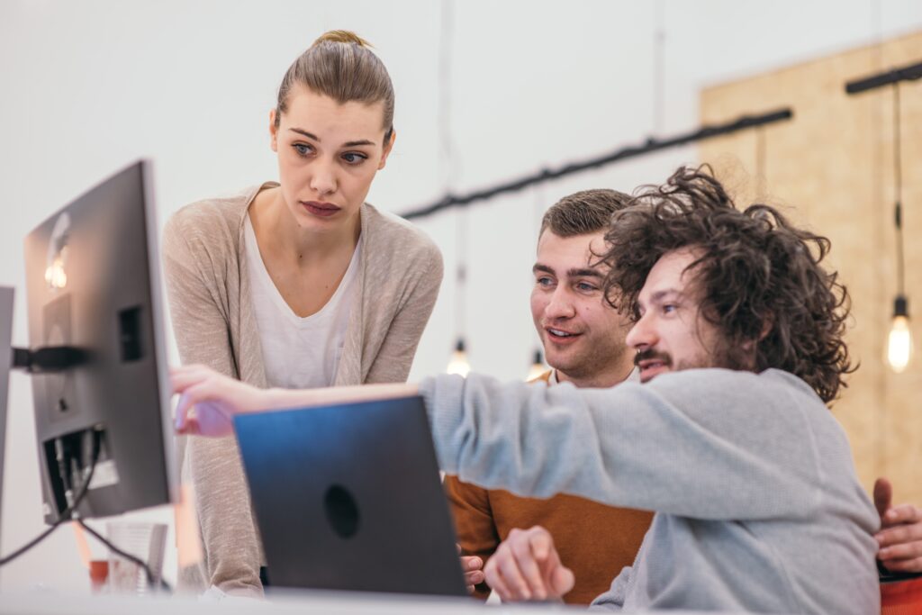 Team deciding between an AI SEO agency, a platform and in-house work